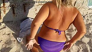 Milf Relaxes on Beach with Self-Pleasure