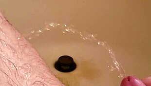 golden shower from old man with small shaved cock