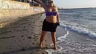 Milf Relaxes on Beach with Self-Pleasure