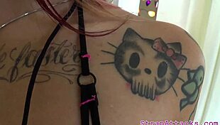 Tattooed dominatrix engages in pegging with her black submissive boyfriend