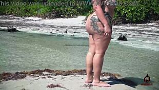 Hot Latina model shakes huge tits and ass on public beach. Her outdoor curves stun everyone!