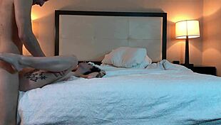 Beautiful tattooed petite young woman in missionary position