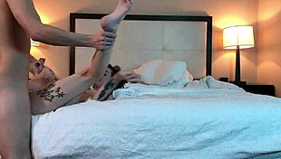 Beautiful tattooed petite young woman in missionary position