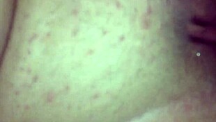 Tattooed amateur couple engages in doggystyle fucking, big cock pounding big ass pussy until clothes rip for creampie