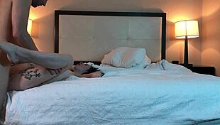 Beautiful tattooed petite young woman in missionary position