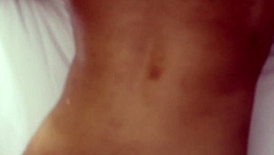 Kinky ebony lesbians engage in intimate play.