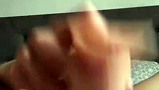 Brunette real girl playing with a dildo.