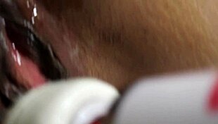 Kinky ebony lesbians engage in intimate play.