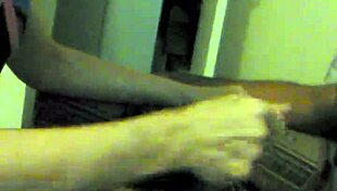 amateur couple enjoys handjob and blowjob while smoking a cigarette in the chair