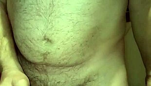 Bound handjob causes massive erection.