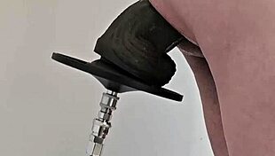 monster black dildo fucks ass from the side on machine