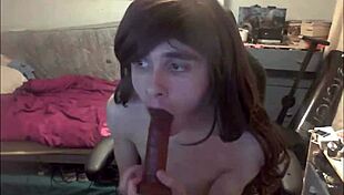 Shemale teen dildoing mouth and stroking cock