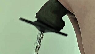 monster black dildo fucks ass from the side on machine