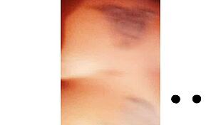 Npleasures bends over to show her new ass tattoo