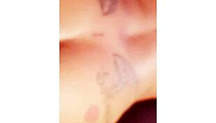 Npleasures bends over to show her new ass tattoo