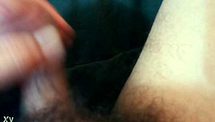 the guy plays with his cock in a casual way.