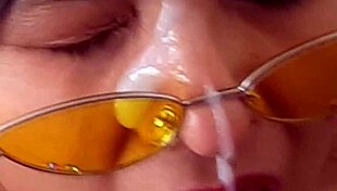 BBW babe swallows cum in slow motion facial scene.