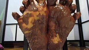 my feet with varnished nails all covered in chocolate cream, goddess-style in the garage pov