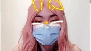 shemale in corset masturbates with stockings and heels