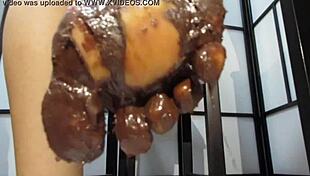 my feet with varnished nails all covered in chocolate cream, goddess-style in the garage pov