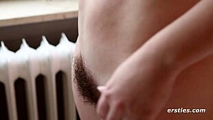 Anabelle small tit redhead rubs hairy pussy to orgasm