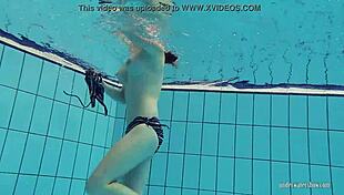 Redheaded Katrin STRIPS UNDERWATER in Sultry Pool Tease