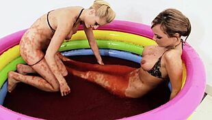chloe conrad and leila bee masturbate in a pool of strawberry jelly?