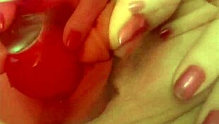 Hot blonde masturbates pussy while sucking dildo.