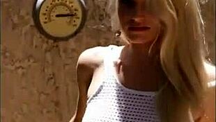 Liz Ashley Undresses in 2015 Retro POV Shoot, Ripping Clothes for Striptease Close-Up.