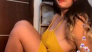 sexy girl in yellow dress showing her big tits on cam! 😍