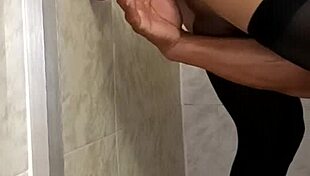 playing with dildo in bathroom