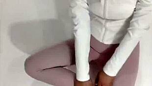 A young Asian girl in black pantyhose has a solo pleasure time at night and stimulates herself to an orgasm