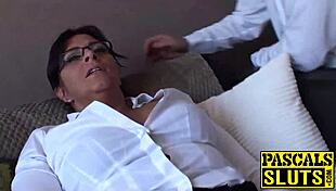 Amber, the busty milf, fingers her pussy alone on the sofa