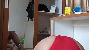 Sexy gay in red cd and mask plays anal with toy