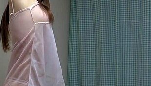 Busty Japanese girl dances seductively