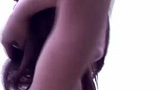 firefighter woman splashing in the pool with her partner