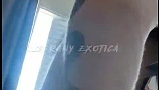 Albina flaunts her big tits and ass while stuffing shorts deep in her tight hole