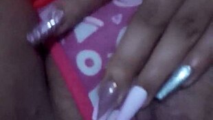 A brunette Brazilian babe indulges in solo masturbation, teasing her ass and pussy.