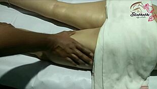 Indian lady receives a relaxing full body massage at home