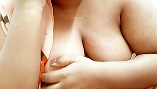 hey, check out this indian sexy aunty with those big tits shaking 😍