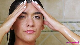 cute brunette makes the shower a sensual photoshoot scene 😊