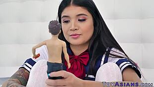 Busty Asian Teen in Cosplay Sucking