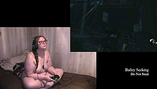 Naked brunette with big tits and tattoos plays through The Last of Us Part 2, showcasing her nude body and fetish elements.