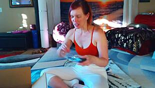 Redhead milf tries on dress and unboxes items