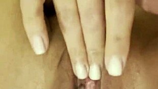 Nuria Millan reaches orgasm while thinking of you, her shaved pussy wet and horny