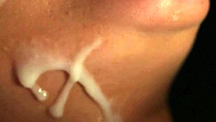 feisty idol receives cum load on face while sucking jizz in blowbang bukkake.