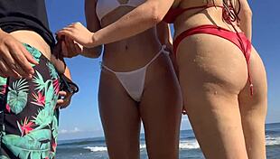 Hey, wanna see me jerk off at public beach with two sexy chicks helping out?