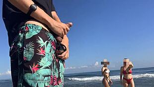 Hey, wanna see me jerk off at public beach with two sexy chicks helping out?