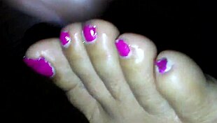 Black beauty gives a foot job with cum on her feet