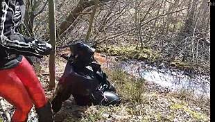 Rich German femdom in latex dominates outdoors brutally.